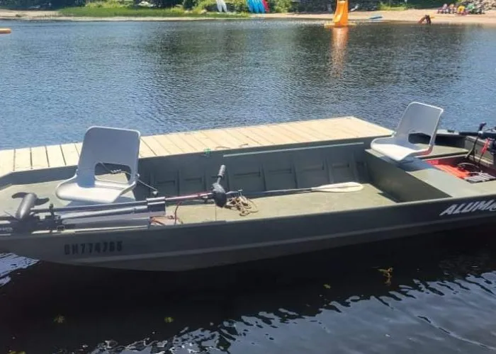 A power boat docked on water